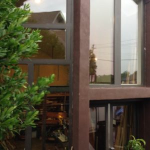 Exterior view of West wall with clipped W by NW wall