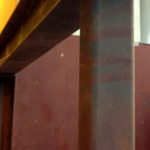 Structural steel adjoining ballistic material of storm shelter will be incorporated into design for second floor (cantilevered section of I-beam to support sliding stainless metal storm ingress/egress door)